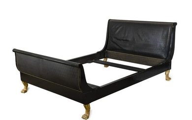An Empire Style Ebonized and Gilt Wood Sleigh Bed