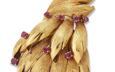 An Italian, ruby brooch, of stylised foliate design, each petal with single claw-set ruby, stamped Italy, 18k, length, 6cm