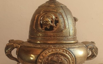 An Oriental brass koro, 4.35" high.