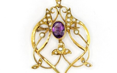 An antique 9ct yellow gold brooch/pendant set with an oval and pear cut amethyst and seed pearls, L. 4.5cm.