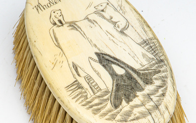 An antique walrus tusk brush marked "Whaler Orca 1876" (L:12cm)...