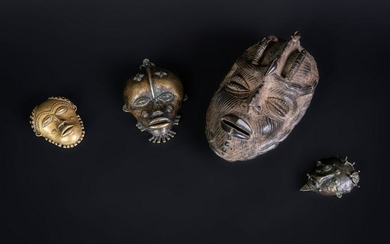 Arte africana Four metal masksSub-Saharan Africa.