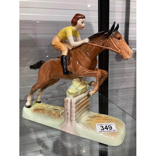 Beswick, a Girl on Jumping Horse figure, model number 939, 2...
