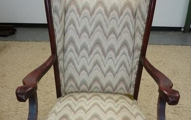 CARVED UPHOLSTERED WING BACK ARM CHAIR