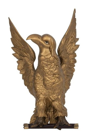 CARVED WOODEN EAGLE America, Late 19th/Early 20th Century Height 30.25”. Width 17.5”.