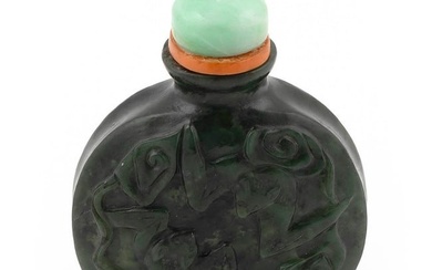 CHINESE CARVED MOTTLED GREEN JADE SNUFF BOTTLE Late 19th/Early 20th Century Height 2.5". Celadon