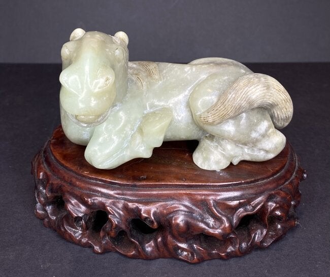 Chinese jade horse on wood stand
