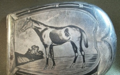 Cigarette case in the shape of a horseshoe. Horse. Silver, niello