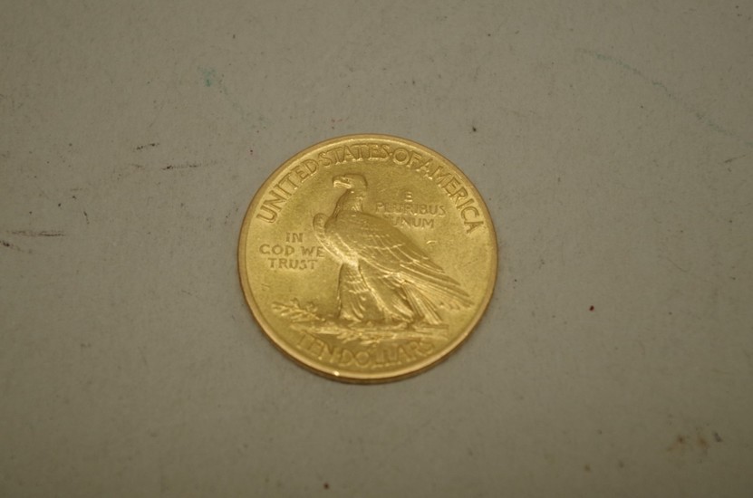 Coins: a US 1913 Indian head gold ten dollar coin....