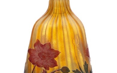 Daum, a cameo glass bottle with flower form stopper c.1902,...