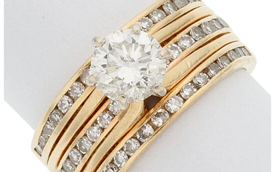 Diamond, Gold Ring The ring centers a round brilliant-cut...