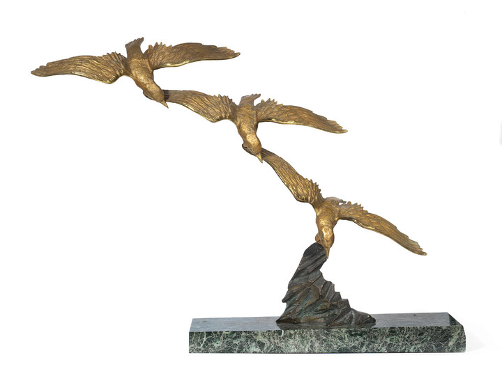 E. Tissot (French, fl. early 20th century): An Art Deco patinated and gilt bronze model of three stylised seagulls