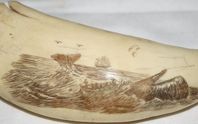 EARLY 20TH CENTURY SCRIMSHAWED WHALE'S TOOTH