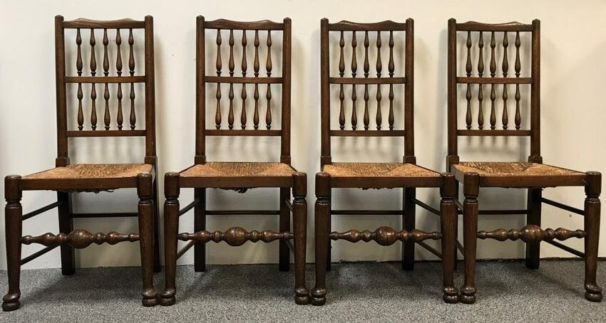 FOUR ANTIQUE ENGLISH OAK RUSH SEAT SIDE CHAIRS