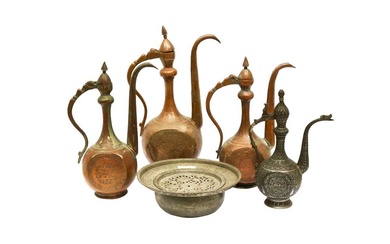 FOUR ENGRAVED TINNED COPPER EWERS AND A BASIN Central Asia, late 19th - early 20th century