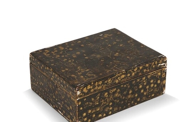 GASTON SUISSE (1896-1988) Petit coffret en bois laqué brun nuagé d'or