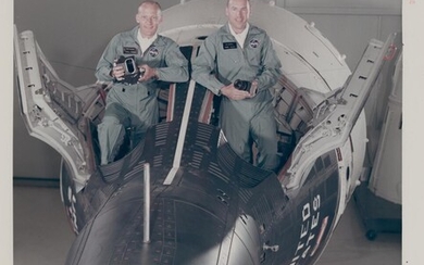 [Gemini XII] Astronaut-photographers Buzz Aldrin and James Lovell posing with the Hasselblad...
