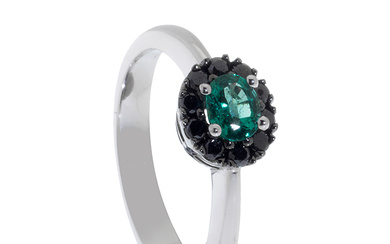 Gold ring with emerald and black diamonds