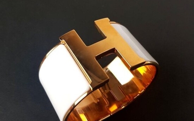HERMES - BRACELET clip "H" in white enamel and gold plated, in its original box
