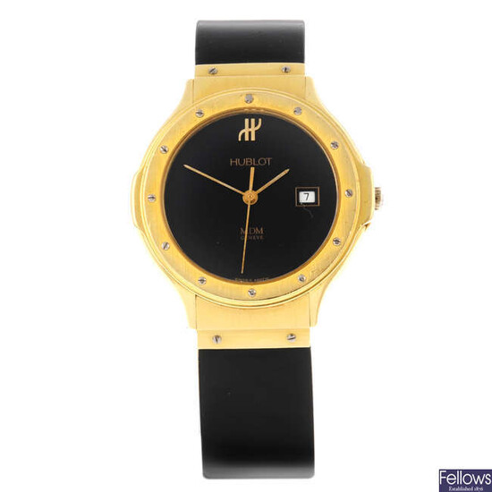 HUBLOT - a mid-size 18ct yellow gold MDM wrist watch.