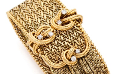 Important bracelet ceinture en or jaune (750) à maille tressée en chevrons bordé de frise...