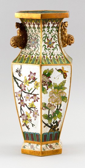 JAPANESE CLOISONNÉ ENAMEL VASE In hexagonal baluster form, with gilt-metal fu dog handles and decoration of flower-filled panels. Fo...