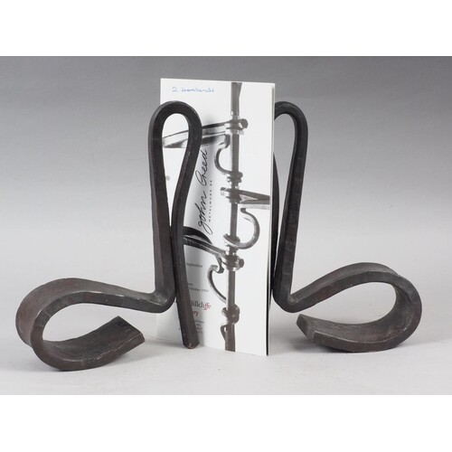 John Creed: wrought steel, a pair of scroll book ends, 11" h...