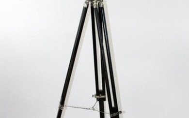 Leather wrapped telescope on tri-pod stand
