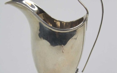 Lot details A George III silver cream jug, of helmet...