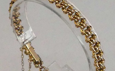 Lot details A yellow metal fancy interlocking circular link bracelet,...