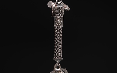 Magnificent large silver chatelaine decorated with various charms, Dutch hallmarks...