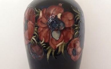 Mid 20th century Walter Moorcroft Pottery Anemone pattern vase. Stamped to underside with Moorcroft - Made in England and initial 'F' for decorator's mark. Circa 1970. Height 33cm.