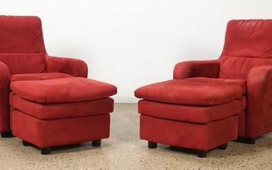 Pair Roche Bobois club chairs and ottomans. Chair Dimensions: 35" X 30.5" X 37.5" Seat Height