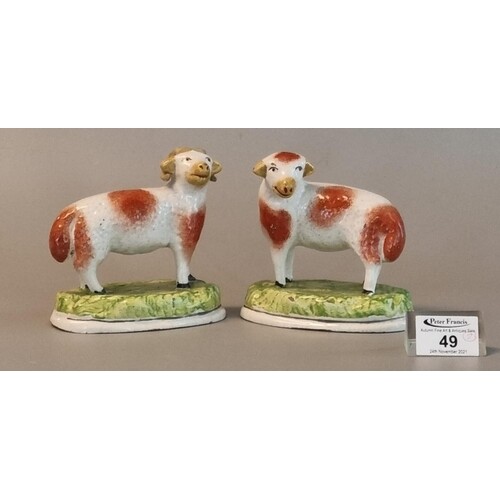 Pair of 19th Century Staffordshire pottery red and white col...