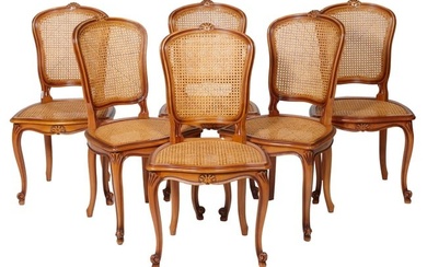 Set of Six French Louis XV Style Caned Walnut Dining Chairs, 20th c., the shell carved caned shield