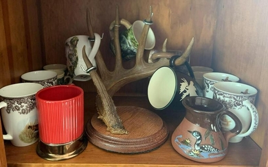 Shelf lot of miscellaneous mugs and antler mug stand