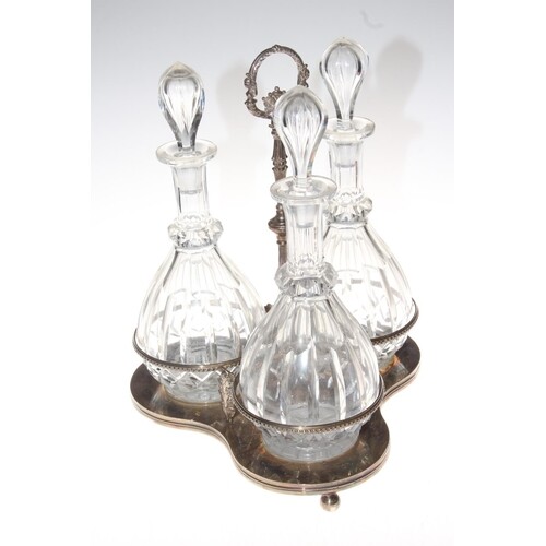 Silver plated decanter stand with three glass decanter bottl...
