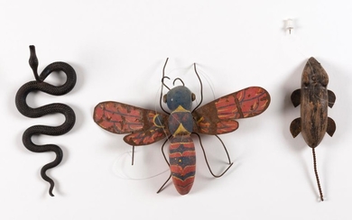 THREE ANIMAL FIGURES 1) Flying wasp with carved and painted wooden body and paint-decorated tin wings. Length 6". 2) Metal slitherin...