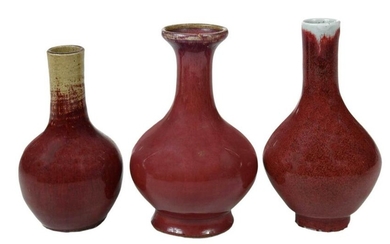 Three Chinese Sang de Boeuf Bottle Form Vases