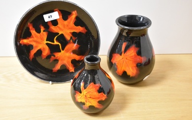 Two 20th Century Poole pottery vases and dish, in the Forest Flame pattern, the largest vase