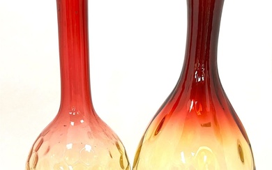 Two Amberina glass bottles