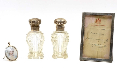 Two silver mounted and glass scent bottles