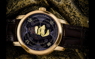 VACHERON CONSTANTIN. AN IMPRESSIVE AND EXTREMELY RARE 18K PINK GOLD LIMITED EDITION AUTOMATIC WRISTWATCH WITH DAY, DATE AND 18K GOLD HAND ENGRAVED MICRO SCULPTURE OF AN INDONESIAN WAYANG TOPENG ANTIQUE MASK FROM THE BARBIER-MULLER MUSEUM METIERS...