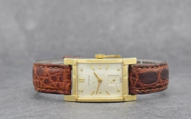 WITTNAUER 14k yellow gold rectangular gents wristwatch
