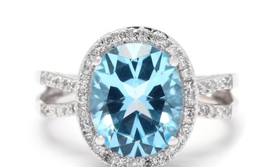 White Gold, Blue Topaz, and Diamond Ring