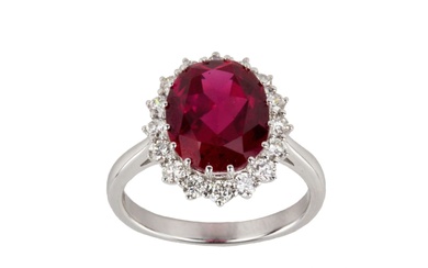 White gold ring with synthetic ruby and diamonds.