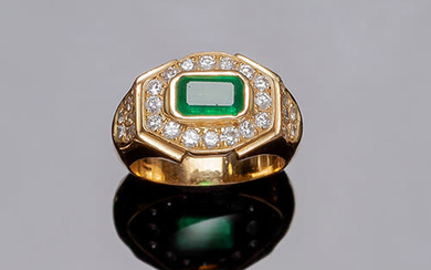 Yellow gold ring with a beautiful emerald, in its...