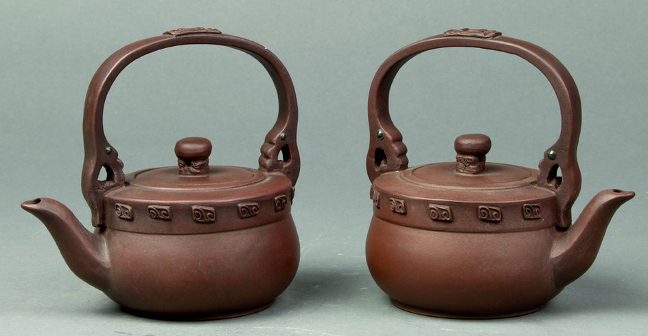 (lot of 2) A pair of handled Yixing Teapots