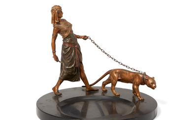 An Austrian Cold painted bronze and black marble Egyptian Woman and Leopard vide poche
