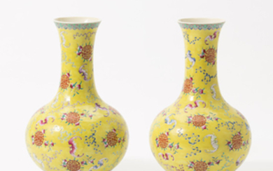 A pair of Chinese yellow-ground vases
